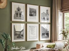 a living room with green walls and pictures on the wall