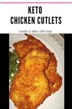 chicken cutlets on a white plate with greens