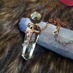 "Inspired by my fascination with the spirit world and the tools used to bridge the veil, I created this OOAK piece. A mystical crystal ball sits atop a smoky quartz point dripping with copper reminiscent of the way melted wax drips down a candle. This pendant measures approximately 2.75\" long and hangs from a 22\" chain with 2\" extension. If you need a different length chain, please ask. All my copper electroform pieces are treated with a sealant that helps prevent allergic reaction for those Spiritual Silver Crystal Necklace With Copper, Soldering Pendants, Forest Jewelry, Crystal Ball Necklace, Quartz Crystal Pendant, Electroformed Jewelry, Spirit World, The Veil, Allergic Reaction