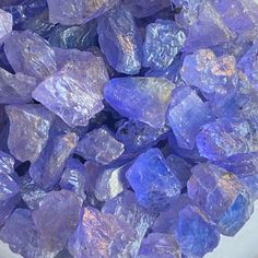 PRODUCT DETAIL: - Gem: Tanzanite - Origin: Tanzania - Type: Raw Rough - Crystal Family: Zoisite - Color: Blue and Violet - Grade: AAA - Quality: Cut, Cabs & Beads Grade - Size, Weight and Pieces:  (A) 6-8mm: 50cts- 20-22 Pcs (Approx)  (B) 8-10mm: 50cts- 12-14 Pcs (Approx) (Please Choose Lot Weight and Stone Size in Option) - Lot Weight: 50cts, 100cts or 500cts Use: For Lapidary, Cut stone, high-grade cabs making. For Artisan, Raw Rings, Pendant, Earring Making Please note: These are Natural Tanz Tanzanite Aesthetic, Raw Rings, Raw Tanzanite, Minerals Crystals Stones, Raw Gemstone Ring, Purple Gems, Tanzanite Stone, Cool Rocks