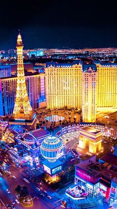 las vegas at night with the eiffel tower lit up