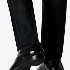 A proper tux isn't complete without a pair of classic black patent leather lace-ups. Thanks to their slim profile, our calf leather Blake-stitched shoes lend a contemporary finish to the traditional black-tie attire. Formal Black Loafers With Glossy Finish, Black Glossy Loafers For Formal Occasions, Black Glossy Finish Formal Loafers, Black Glossy Finish Loafers For Formal Occasions, Elegant Business Oxfords With Glossy Finish, Modern Fitted Oxfords With Pointed Toe, Classic Glossy Finish Formal Loafers, Fitted Patent Leather Dress Shoes For Semi-formal Occasions, Sleek Patent Leather Loafers With Leather Sole