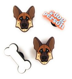 three dog magnets with a bone in the middle and a sticker on top