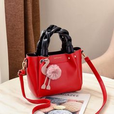 Color: red Red Double Handle Bag With Mobile Phone Pocket, Red Double Handle Bag For Mobile Phone, Red Portable Handheld Shoulder Bag, Red Handheld Portable Shoulder Bag, Red Shoulder Satchel Bag, Red Portable Bag For Daily Use, Red Travel Satchel, Red Top Handle Bag For Mobile Phone, Red Handheld School Bag