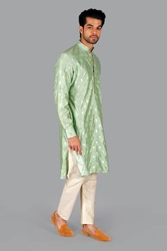 Green banarasi silk kurta with woven floral blossom motifs. Comes with pant. - Aza Fashions Silk Sherwani With Naqshi For Diwali, Silk Sherwani With Dupatta For Navratri, Festive Cotton Silk Kurta With Naqshi Detail, Festive Silk Bandhgala With Naqshi Details, Festive Silk Bandhgala With Naqshi, Festive Silk Kurta With Naqshi Detail, Silk Kurta With Naqshi For Festivals, Festive Silk Kurta With Naqshi, Traditional Silk Wear With Naqshi For Festivals