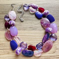 💞One of a kind & ready to ship💞  I 💜 this color palette!  16 inches long with a 4 inch extender chain. Silver hardware and accents.  Thank you for supporting handmade and small American business! Hate to wait? Me too! I ship 6 days a week.  Like this style but prefer another color? Check out our other BIG BEAD necklaces:  https://www.etsy.com/shop/PolkaDotDrawer?ref=hdr_shop_menu&search_query=big+bead Purple Large Beaded Necklace, Bohemian Purple Necklace With Lobster Clasp, Pink Beaded Jewelry, Black Necklace Statement, Chunky Statement Necklace, Rose Blush, Pink Beaded, Resin Beads, Support Handmade