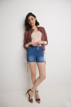 Designed with comfort and style firmly in mind, this slimming jean short features a smoothing wide-contour waistband with a hidden elastic for pull-on style. Effortless to wear, yet incredibly chic, this short allows you to be both comfortable and confident through summer days. The 5-inch inseam lies at the perfect length to flatter the leg, while the wider opening visually slims down the legs making them appear longer and more beautiful. This will be your go-to short for the summer thanks to it Bolero Dress, Jean Short, Loungewear Shorts, Denim Cotton, How To Slim Down, Denim Pant, Look Chic, Summer Days, Short Tops