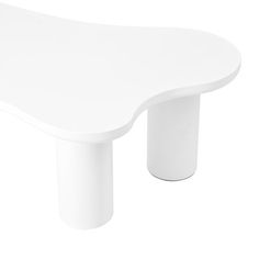 a white table that is sitting on a white surface with one leg up and the other end down