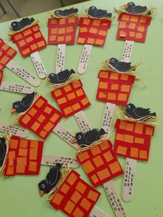 several pieces of paper with birds on them