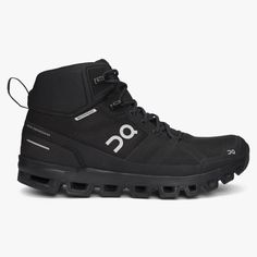 a pair of black hiking boots on a white background, with the word on it