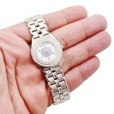 Ladies Mauboussin 26mm - 18K White Gold Watch With Mother of Peal Dial and Diamond Bezel. Pre-Owned #63683 Crystal: Sapphire. Gender: Women's. Brand: Mauboussin. Condition: Excellent. Case Back: Solid Case. Model Number: 63683. Case Dimensions: 26mm. Dial Color: Mother of Pearl. Movement: Quartz (Battery). Metal Type: 18K White Gold. Bracelet / Strap: 18K White Gold. Bracelet Size: Fits up to 6.5 Wrist. Bezel: 18K White Gold / Diamond Bezel. Box: Includes Aftermarket Wooden Mahogany Box. Service White Gold Watch, New Rolex, White Gold Bracelet, Gold Case, Bezel Diamond, Watch Brands, Bracelet Sizes, White Gold Diamonds, Gold Watch