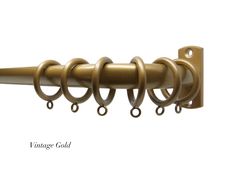 an image of a metal curtain rod with rings on it