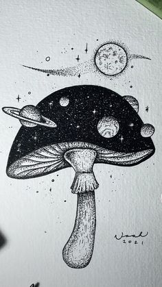 a black and white drawing of a mushroom with planets on it's back ground