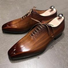 Elevate your shoe game with these bespoke leather handmade shoes. Made with genuine leather, these oxfords come in brown, and are available in all US, UK, EU, and AU sizes. The comfortable insole and standard shoe width make them perfect for any occasion. Designed with a solid pattern and lace-up closure, these handmade shoes are a vintage addition to any wardrobe. The leather outsole adds durability and longevity to these unique boots. Customize them to your liking with personalization options Luxury Cap Toe Gentleman Leather Shoes, Adidas Sl 72, Official Shoes, Gentleman Shoes, Oxford Boots, Bespoke Shoes, Handmade Leather Shoes, Brown Leather Shoes, Oxford Shoes Men