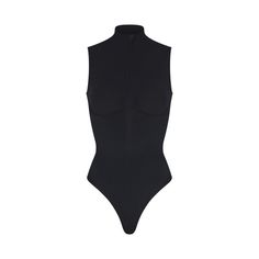 Just add bottoms. Designed to be seen, this thong-back bodysuit sculpts your figure with strong targeted compression at your tummy, waist, and back. Sup... Front Zipper, Onyx, Design