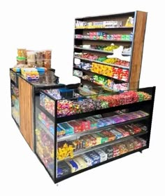 the display case is filled with many different types of snacks and candy bars in it