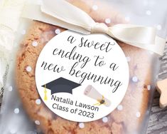 a sweet ending to a new beginning graduation cookie