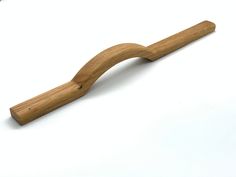 a wooden toothbrush on a white background