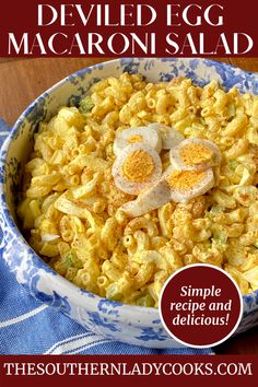 deviled egg macaroni salad in a blue and white bowl with text overlay