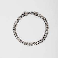 "5mm curb chain bracelet for men in oxidized sterling silver with a unique handmade hook at closure. An everyday piece of jewelry and a great choice as a Christmas gift for him. 100% handcrafted with love! F E A T U R E S * Metal: High-quality Sterling Silver 925 * Finish: Oxidized Silver * Style: Curb * Width: 5mm * Length: 19 - 23cm (7.5 - 9 inches) Sterling silver parts of the jewels are gold plated or rhodium plated in order to be strong, durable and resistant to tarnish. 100% nickel free. D Minimalist Silver Cuban Link Bracelet With Curb Chain, Everyday Silver Cuban Link Bracelet With Box Chain, Classic Cuban Link Jewelry With Stainless Steel Clasp, Everyday Sterling Silver Cuban Link Bracelet With Curb Chain, Minimalist Stainless Steel Chain Link Jewelry, Gunmetal Box Chain Bracelet As A Gift, Gunmetal Link Jewelry With Curb Chain, Minimalist Silver Cuban Link Chain Bracelet, Gunmetal Chain Link Bracelet As Gift