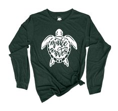 ⭑ Make Waves Sea Turtle long sleeve shirts ⭑ AMERICAN BEAR CUB® ADULT UNISEX SOFT LONG SLEEVE SHIRTS An essential for every age, our newest adult unisex super soft long sleeve shirts fit like a well-loved favorite, featuring a crew neck and long sleeves. Designed with superior ring-spun cotton, rayon and poly giving you that amazingly soft feel that makes you wish you could wrap yourself up in them (feel free to do so). - Unisex sizing - Fabric is 25% combed & ring-spun ethically sourced cotton, Graphic Tee With Front Print Long Sleeve, Long Sleeve Graphic Tee With Front Print, Green Long Sleeve Pre-shrunk T-shirt, Green Long Sleeve Screen Print T-shirt, Green Pre-shrunk Long Sleeve Top, Green Long Sleeve Shirt With Letter Print, Green Long Sleeve Shirt With Screen Print, Artwork Light, Light Artwork