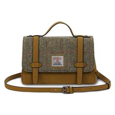 Embrace Scottish craftsmanship with the Orkney satchel! The flap is crafted from authentic Harris Tweed, handwoven in the Outer Hebrides from pure virgin wool, giving it a timeless look and exceptional durability. The body is made from sleek vegan leather, combining style and sustainability. Inspired by Scotland’s stunning landscapes and rich clan history, this satchel blends traditional design with modern flair. Inside, you'll find two spacious compartments and two zippered pockets.The cute flo Tweed Outer, Tweed Scarf, Tweed Purse, Tweed Handbag, Harris Tweed Fabric, Tweed Hat, Tweed Bag, Outer Hebrides, Handbag Outfit