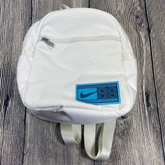 New With Tags Nike Sportswear Futura 365 Mini White/Blue Backpack/Purse 6l Small. White Nylon Gym Bag, Blue Functional Gym Backpack, Functional Blue Gym Backpack, Casual White Bag For Gym, Casual White Gym Bag, Sporty Backpack For Travel, White Nylon Casual Backpack, White Softback Backpack For Outdoor, Functional White Bags For Outdoor