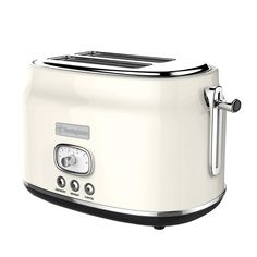 a white toaster sitting on top of a counter next to a black and silver handle