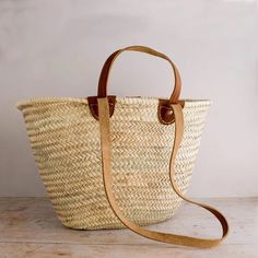 This bag is handwoven in the souks of Morocco, from a palm leaf. It is a "Slow Fashion" product representing everything that is eco, ethical and green. Even though this Spring & Summer season is all about straw. Small round wicker French basket, hand woven in Marrakesh by friends and family. Ideal small shopper or beach bag. Also a perfect bag or gift for a girl - great for school books etc. This braided bag is perfect anytime and everywhere, Especially in the summer and there are those who like French Market Bag, Palm Baskets, French Basket, French Market Basket, Grocery Market, French Baskets, Braided Bag, Rookwood Pottery, Market Basket