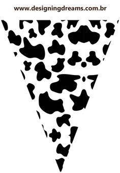 a black and white image of a cow print triangle with the word design dreams on it