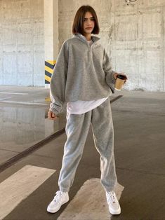 Cozy Oversized Gray Polar Fleece Tracksuit for Women | Hoodie and High-Waisted Pants Two Piece Set | Warm Soft Winter Loungewear Stay warm and stylish with this premium oversized tracksuit set, made from high-quality polar fleece fabric that's designed to keep you cozy in any weather. The fabric is super soft, doesn't pill or lose its texture after washing, and resists friction, making it a durable choice for daily wear. Perfect for fall and winter, this set combines comfort with a modern oversized look. Key Features: Material: Premium polar fleece (won't pill or shrink after washing) Top: Oversized hoodie with adjustable drawstring hem for the perfect fit Pants: High-waisted sweatpants with elasticated cuffs for a comfortable, snug fit Details: Metal zipper closure on the neckline for add Trendy Leisure Joggers, Casual Joggers For Workout, Luxury Casual Winter Tracksuit, Luxury Winter Sweatshirt For Loungewear, Affordable Casual Hoodie For Leisure, Cheap Athleisure Workout Hoodie, Cheap Hooded Athleisure Activewear, Cheap Casual Activewear With Relaxed Fit, Affordable Trendy Activewear For Loungewear