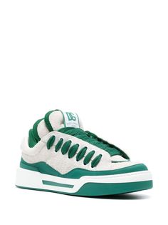 Luxury Green Sneakers For Streetwear, Green Custom Sneakers With Textured Sole For Streetwear, Luxury Green Sneakers With Branded Insole, Luxury Green Low-top Sneakers, Green High-top Sneakers With Textured Sole, Designer Green Lace-up Sneakers, Designer Green Low-top Custom Sneakers, Green Leather High-top Sneakers With Perforated Toe Box, Green Sporty Sneakers With Textured Sole