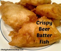 crispy beer batter fish on a plate with the words crispy beer batter fish