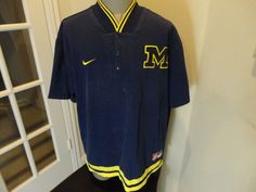 "Pre-Owned Sewn Warmup - Pretty Good Condition For Age - no holes or tears - HAS SOME SPOTS ON FRONT (LAST 2 PHOTOS) - - Nike - Authentic vintage -- - -- SEE PHOTOS Pit to Pit 28.00\" Top to Bottom 33.00\" Tag: Adult 2XL Vtg 90's Nike Blue Sewn Michigan Wolverines NCAA Jersey Warmup Jersey Shirt Adult 2XL Bin 5-H 5 H - 54 JMP  Brand: Nike Sport: Basketball Pre & Post Season: Regular Season Size: 2XL Color: Blue Product: wARMUP Team: Michigan Wolverines Gender: Men Country/Region of Manufacture: Collegiate Cotton Collared Top, Collegiate Collared Cotton Top, Fitted Short Sleeve Fan Gear Tops, Photo Nike, Kids Jackets, Sport Basketball, Nike Vintage, Michigan Wolverines, Nike Sports