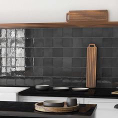 Black and white kitchen with glazed ceramic backsplash tiles in a square design Modern Subway Tile Backsplash Tilebar, Modern Tile Backsplash Tilebar, Black Stacked Tile Backsplash, Glass Backsplash With Black Cabinets, Modern Kitchen Backsplash Brick, Oven Backsplash Tiles, Busy Countertop Backsplash, Kitchen Backsplash Black Countertop Backsplash.com, Contemporary Kitchen Backsplash Brick