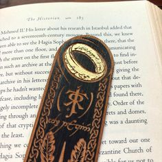 a bookmark with an image of a ring on it