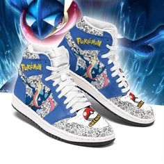 a pair of blue sneakers with pokemon images on them