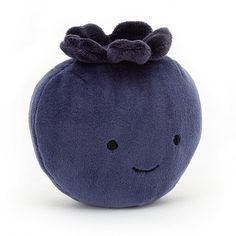 a blue stuffed animal with a bow on top of it's head and eyes