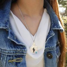 Add A Touch Of Western Flare With Our Silver La Fleur Cattle Tag Necklace! The Perfect Size For A Simple Yet Fun Necklace. Complete With A Small Turquoise Accent Stone! Silver 17" Chained Cactus Cattle Tag Necklace Featuring A Cactus Shaped Cutout. Cow Tag Necklace, Steampunk Key Necklace, Cow Tag, Thick Gold Chain, Dainty Pendant Necklace, Cattle Tags, Blue Stone Necklace, Elephant Necklace, Cool Necklaces