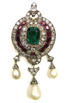 Handmade Item Silver weight: 23.450 Grams Recycling: No Gemstone: American Diamond (zircon), Ruby, Pearl & Emerald Diamond weight: 7.11 ct Diamond shape: Round Diamond Colure: white Ruby weight: 5.67 ct Emerald weight: 8.34 ct Pearl weight: 12.90 ct Pearl, Ruby & Emerald: Lab created Material: Silver Silver purity: 925 Brooch Finished: Oxidized Black & Gold plated Exquisite Round Jewelry Brooch, Exquisite Round Brooch Jewelry, Classic Diamond Gemstone Brooches, Exquisite Jewel Pendant Brooches, Classic Diamond Brooch With Gemstones, Multi-stone Diamond Brooches, Exquisite Jeweled Pendant Brooches, Fine Jewelry Diamond Multi-stone Brooches, Exquisite Pendant Brooches With Jewels