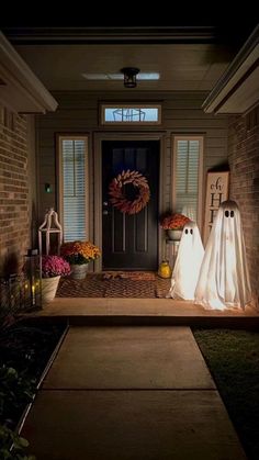 two ghost bags are on the front porch