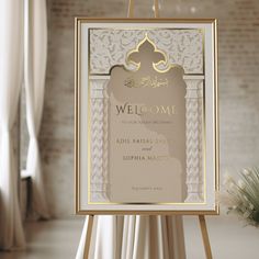 a welcome sign is displayed on an easel