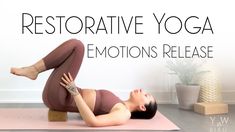 a woman is doing yoga on a mat with the words restorative yoga emotions release