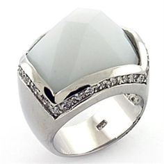 Description To spruce up your party look with bit of sparkle and fun, ensure to wear this fashionable sterling silver ring. Created with an on-trend design and style, this ring will be a valuable addition to your collection. It is also a great choice of gift for your loved ones. Product Features: Sterling silver ring with synthetic glass stone White colored synthetoc glass stone 925 sterling silver band with a rhodium finish Ring size: women's 7 Weight (approx): 18.40 (g) Material(s): 925 sterling silver/synthetic glass Product Specifications Weight Width Height Depth 0.04 LBS 3.00" 3.00" 3.00" Warning: CHOKING HAZARD-Small Parts Adult Supervision Required. Cubic Zirconia Engagement Rings, Luxe Jewelry, Sterling Silver Rings Bands, Engagement Ring Sizes, Party Look, White Jewelry, Silver Band Ring, Bridal Jewelry Sets, Rings For Her