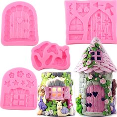 three cookie molds with houses and animals on them, one has a pink house