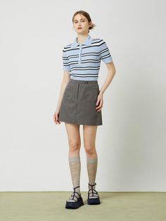 This semi A-line mini skirt is a versatile piece with a unique touch, featuring an out pocket for added interest and a front waist key button decoration for a stylish design.- The stitch details throughout for a clean and modern look- Front center zipper for easy wear- Cool polyester material with lining for reduced friction* The color of the actual product may vary due to differences in monitor color settings and resolution. Office Mini Skort With Pockets, Modern Mini Skirt With Pockets, Modern Workwear Mini Skort, Modern Workwear Mini Skirt, Button Decorations, A Line Mini Skirt, Easy Wear, Polyester Material, Stylish Design