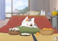 an image of a cat sitting on the couch with food in front of it,