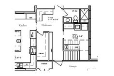 the floor plan for a two bedroom apartment with an attached kitchen and living room area