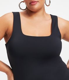 From Good American Plus&#x2C; this bodysuit features:Luxurious scuba compressive fabricationThong silhouette Square necklineWide strapsButton closureNylon/elastaneHand washImported. Sleeveless Shapewear Bodysuit With Medium Bust Support, Sleeveless Bodysuit With Medium Bust Support, Compressive Sleeveless Shapewear, Compressive Seamless Sleeveless Shapewear, Seamless Compressive Sleeveless Shapewear, Black Sleeveless Bodysuit With Medium Bust Support, Compressive Sleeveless Shapewear Bodysuit, Compressive Sleeveless Elastane Bodysuit, Seamless Sleeveless Shapewear