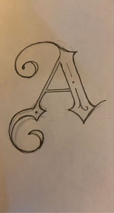 the letter a is drawn in pencil on paper